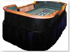 Craps Table - These Crap Tables have folding legs to make delivery possible to just about any location.  The tops are fully-equipped and feature overall hardwood construction, a casino green felt/playing surface, diamond pyramid rail rubber walls, an accented wooden ridge, and an overall impressive Vegas Casino-style look.